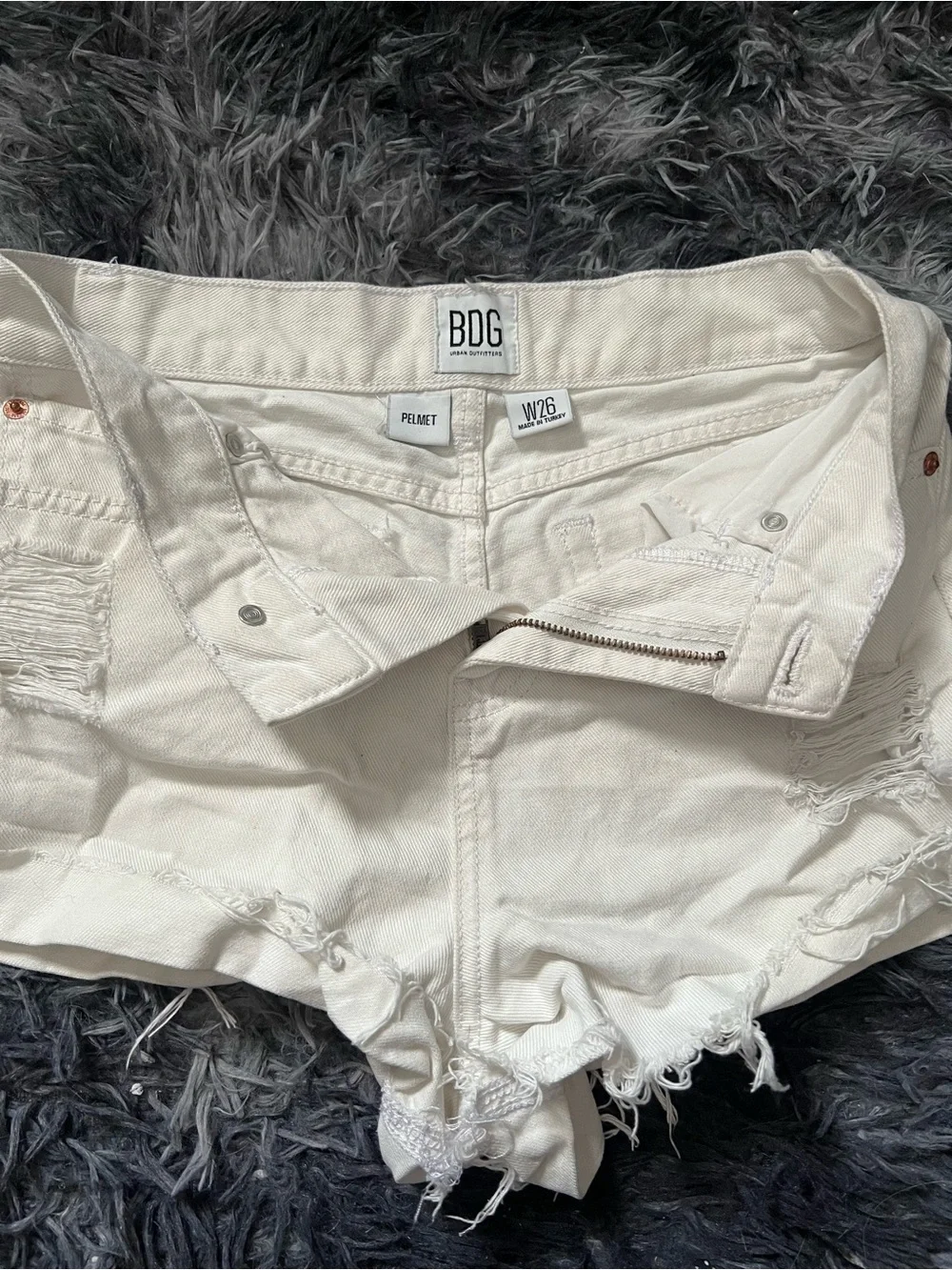 BDG white distressed denim shorts